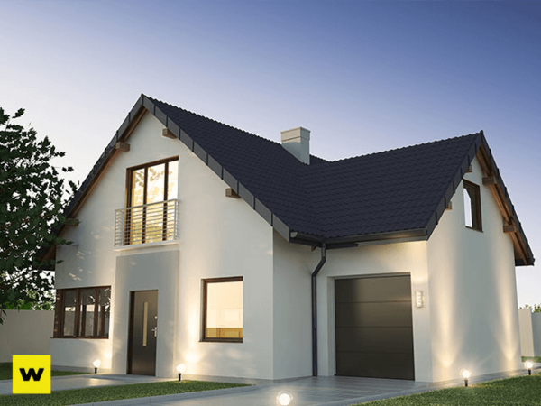 Modernes Einfamilienhaus mit Garten, Garage und großen Fenstern bei Sonnenuntergang.